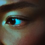Close-up of eye with dramatic lighting.