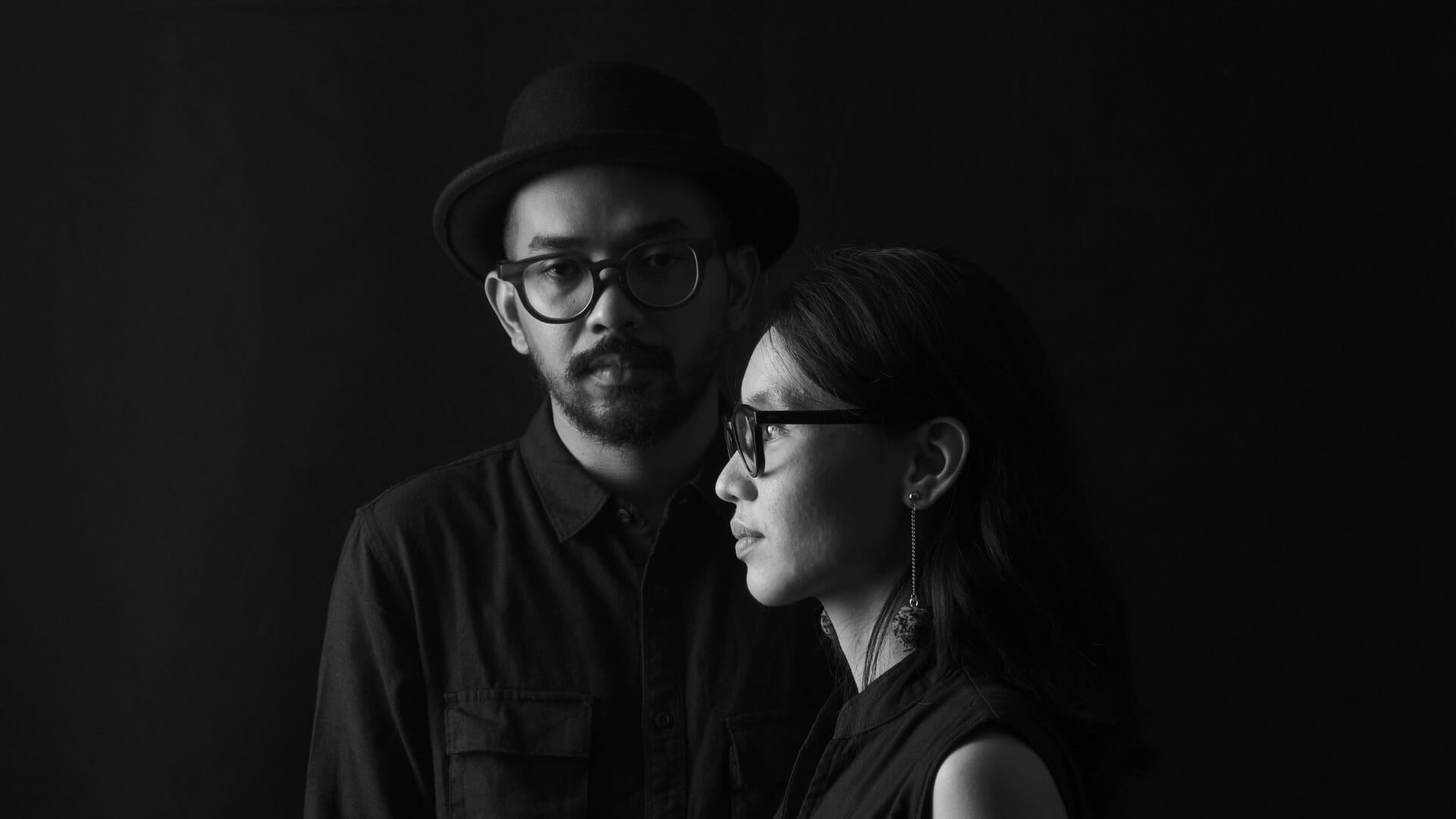 Black and white portrait of two people.